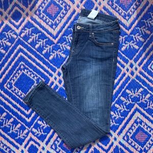 H&M skinny jeans, mid blue wash, stretchy.
